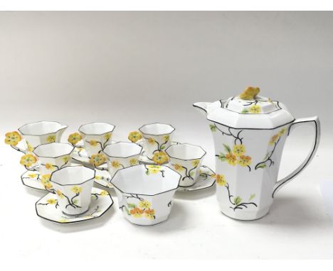 A melba Art Deco pattern coffee set with a yellow floral pattern. The milk jug is a/f as pictured.