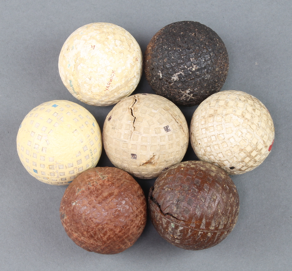 A Warwick vintage golf ball, 3 Spalding ProFlite golf balls and 3