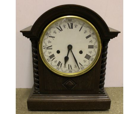 A 20th Century oak cased two hole mantel clock