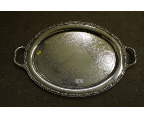 A silver plated twin handled drink's tray