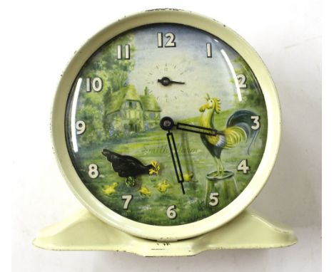 A Smiths tin plate alarm clock