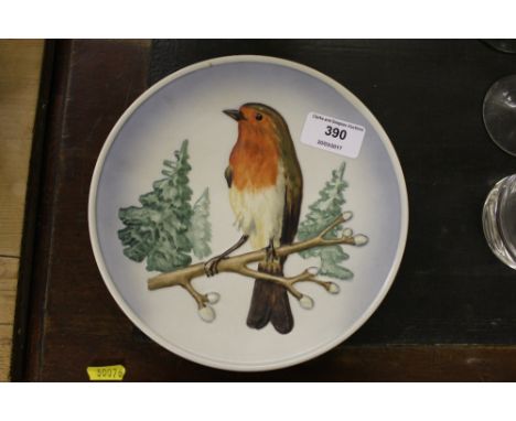 Two Goebel plates and one other plate