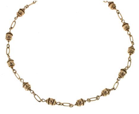 Chain of alternating sphere and long links, unmarked but for '375' to the clasp, 72cm long, 30.5g approx