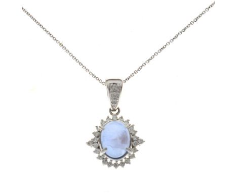 Star sapphire and diamond pendant set in white metal stamped 'Pt900', on a white filed link chain stamped '750', 42cm long, 5