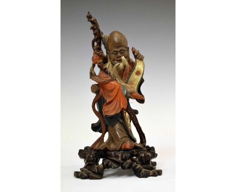 Chinese carved painted wooden figure of Shoulao, circa 1900, modelled with staff, red robes and gilt scroll, real hair beard,