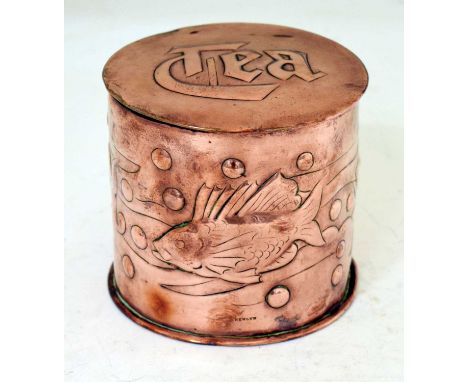 Newlyn copper tea caddy, of cylindrical form repousse decorated with fish amidst seaweed, the cover marked 'Tea', stamped 'NE