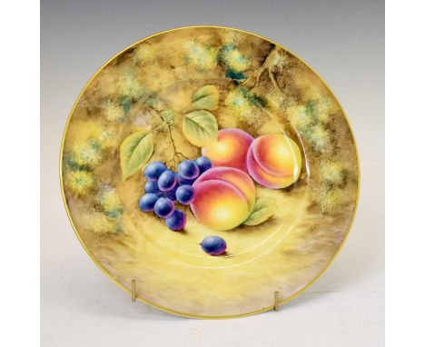 Royal Worcester porcelain fruit decorated plate, painted by J. Smith, black printed and painted marks, 27cm diameter