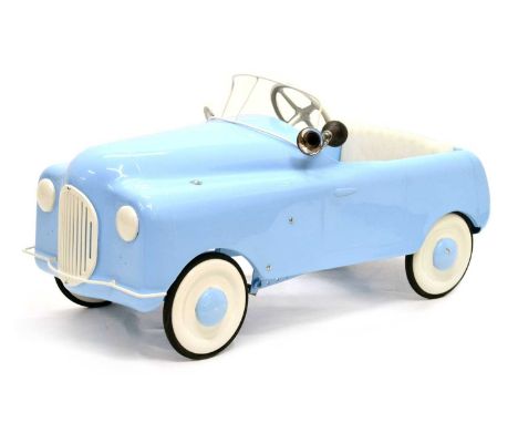 Child's vintage light blue pedal car, possibly Canadian Triang, metal in construction with grill and headlight detailing, one