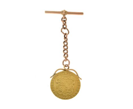 Soldered George III Guinea, 1773, to a short 9ct gold section of chain, with a T-bar, 13.6g gross approx