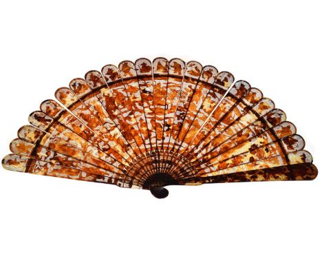 19th century Chinese Canton tortoiseshell brisé fan, decorated with a complex processional scene of numerous figures, some on