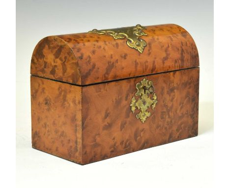 Late Victorian burr maple tea caddy, of domed trunk form with gilt metal mounts, the hinged cover with water silk lining encl