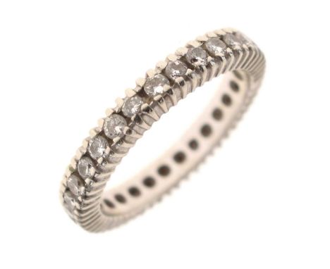 Diamond eternity ring, in unmarked white metal, the twenty-nine brilliant cuts estimated as totalling approximately 0.58ct, s