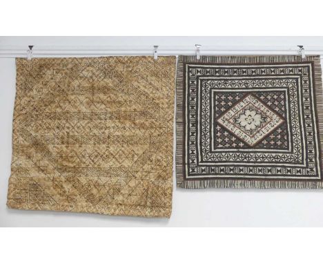 A group of three Tapa (South Pacific) tribal wall hangings sections, each having a stylised geometric decoration