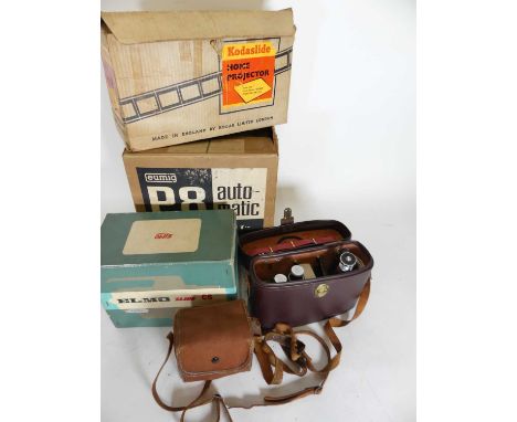 A Paillard Kern II compact cine camera in fitted leather case, together with a Kodak projector and other related items