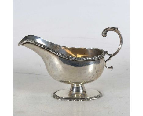 A George V silver pedestal sauce boat, of helmet shape, George Nathan &amp; Ridley Hayes, retailed by Asprey, Chester 1913, 7
