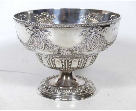 An Edwardian silver pedestal bowl, repoussé decorated with floral swags, on a domed foot, Fenton Brothers Ltd, Sheffield 1902