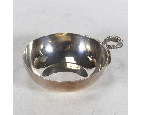An Elizabeth II silver wine taster, having entwined serpent handle, Baker Brothers Silver Ltd, Birmingham 1978, dia 8.5cm, 2.