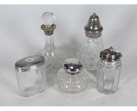 An Elizabeth II miniature glass ship's decanter, having a silver collar, Mappin &amp; Webb Ltd, Birmingham 1891, height 16cm,