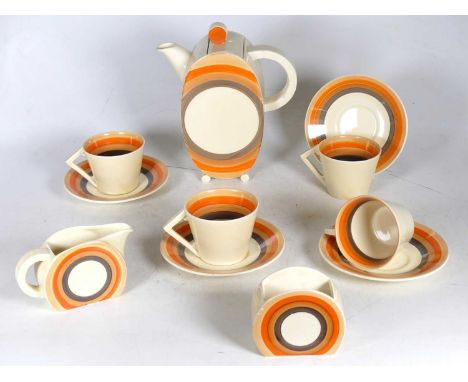 A Clarice Cliff for Wilkinson Ltd coffee service, four place settings, decorated with orange and brown concentric circles, co