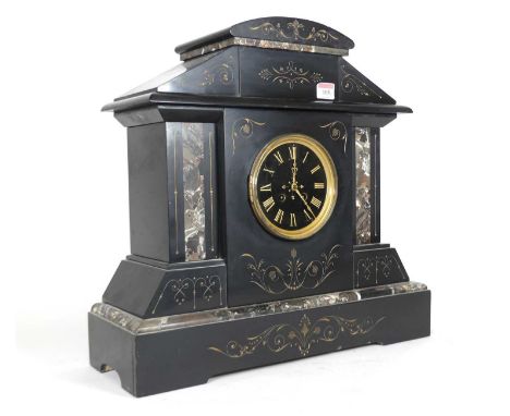 A late 19th centry black slate mantel clock of architectural form, the dial with gilt Roman numerals, having an eight day mov