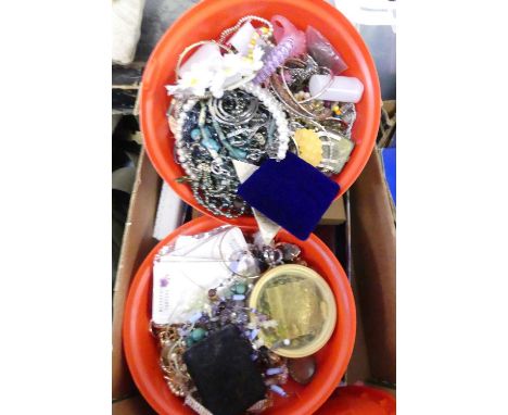 A collection of costume jewellery to include paste set brooches, simulated pearl choker, bangles, ear studs, and chains