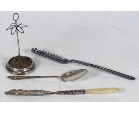 A George V silver mounted hat pin stand, Henry Williamson Ltd, Birmingham 1912, h.11cm, together with a silver teaspoon and b