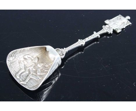 A Dutch silver and embossed caddy spoon, 20.8g, 12.5cm