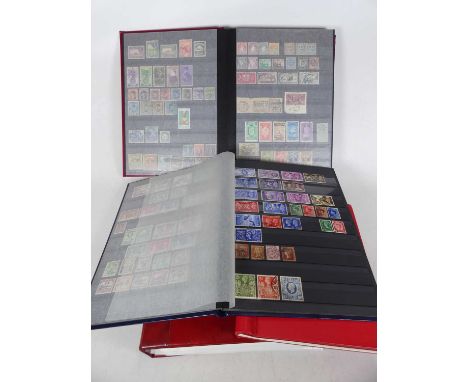A stamp album and contents to include examples from USA and Liberia, and India, together with three other albums (4)Stamps fr