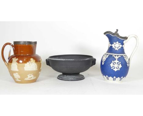 A Doulton Lambeth salt glazed stoneware harvest pattern jug, having a silver mounted rim, impressed mark to the underside, he