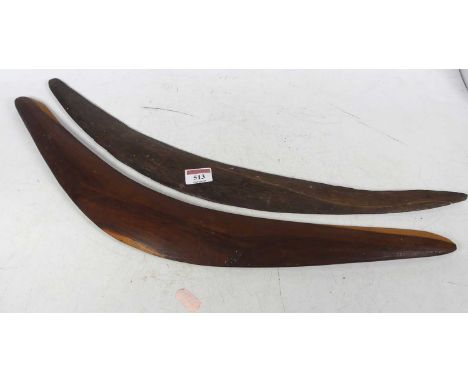 An Aboriginal wooden boomerang, length 58cm, together with another
