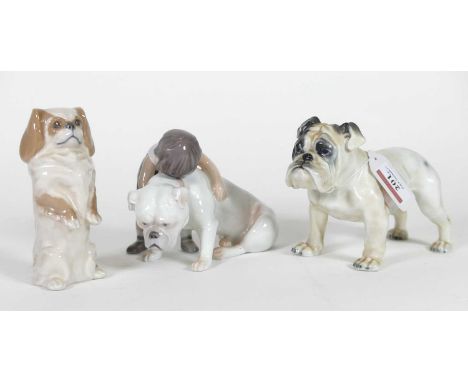 A Rosenthal porcelain figure of a bull dog, modelled standing, green under glaze mark to the underside, length 15.5cm, and a 