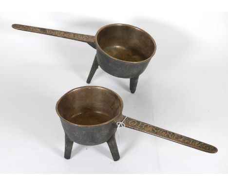An 18th century cast bronze skillet, by Robert Street &amp; Co., dia. 16.5cm, together with another smaller