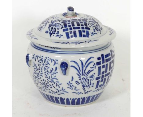 A Chinese porcelain jar and cover, with underglaze geometric and floral decoration, h.22cm 