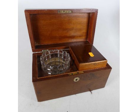 A 19th century mahogany tea caddy of rectangular form, the hinge lid opening to reveal a fitted interior, width 25cm