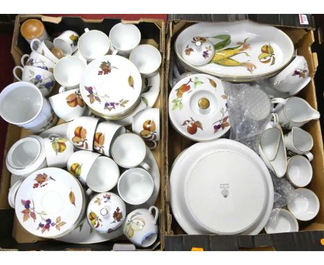 A collection of Royal Worcester Evesham pattern table ware to include tureens, teacups and saucers, serving dishes and sauce 