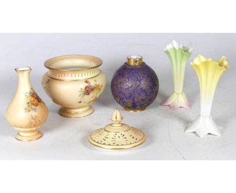 A Royal Worcester porcelain vase, having a reticulated gilt rim and further gilt foliate decoration on a purple ground, puce 