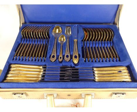 A Solingen 24ct gold plated eleven setting cutlery set housed in a briefcase.