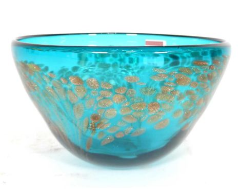 A contemporary turquoise art glass bowl having gilt included decoration, dia. 24.5cm