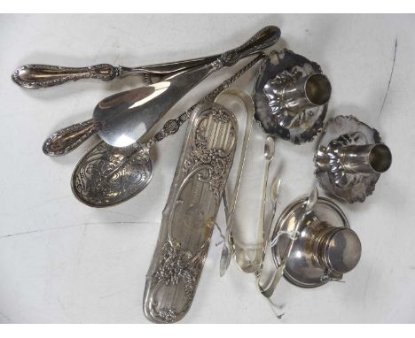 An Edwardian silver annointing spoon, Elkington &amp; Co, London 1902, L.18cm, together with three pairs of silver sugar tong