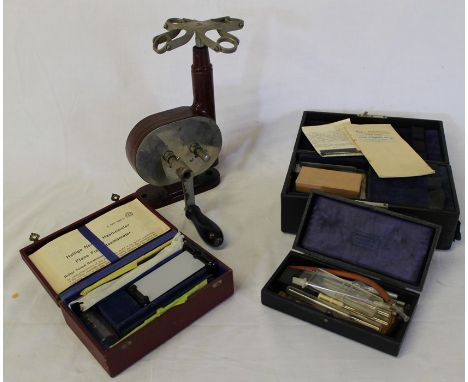 Manual centrifuge test tube instrument with cast metal body in burgundy, Eve's Halometer, Hellige Normal Haemometer &amp; sel