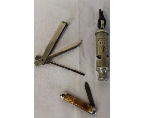 World War One whistle dated 1916 with broad arrow mark &amp; remains of original leather strap, miniature penknife &amp; fold