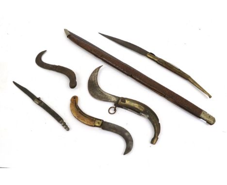 An Unusually Large Spanish Navaja Folding Knife, the 66cm steel blade double edged for the last 32cm, folding into the chip c