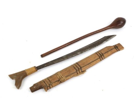 An Australian Aboriginal Club, with ovoid head and curved tapering haft, 52cm; a Dyak Mandau (Headhunter's Sword), Borneo, wi