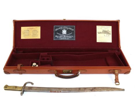 A Mid-20th Century Holland and Holland Leather Shotgun Case, with stitched leather strengthened angles, securing straps and r