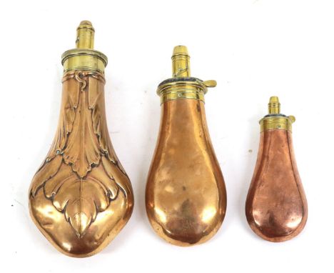 A 19th Century Copper Powder Flask, of plain form, the brass charger with internal steel spring and stamped DIXON PATENT; a 1