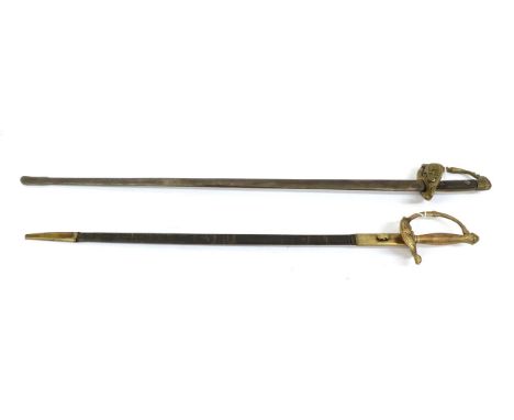 A Continental Court Sword, with 75cm double edge steel blade stamped TOLEDO 1867, the gilt metal hilt with shell guard cast w