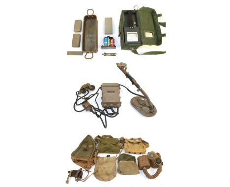 A Cold War Period Portable Dose Rate Meter Type 1155B (Geiger Counter) by E K Cole Ltd., in green webbing case stencilled M.E