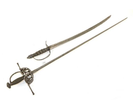 An 18th Century Spadroon, the 63cm single edge fullered steel blade engraved with birds and tendrils, the steel hilt with two