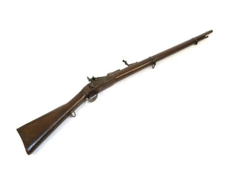 A 19th Century Continental Trapdoor Rifle, the 77cm round barrel with hinged ladder rear sight, the top of the receiver stamp