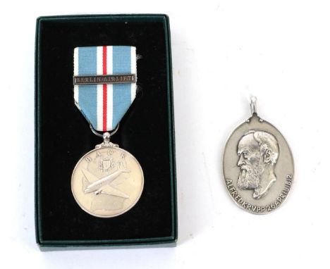 A British Army of the Rhine Medal, with clasp BERLIN AIRLIFT, in box of issue; an Alfred Krupp Silver Centenary Medal 1812-19